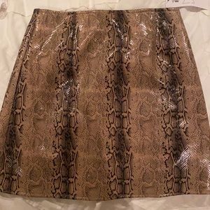 Sage, snake skin design with black and beige. Size XS